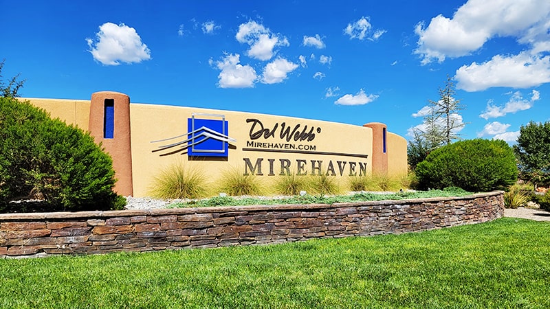 Mirehaven Del Webb entrance in summer